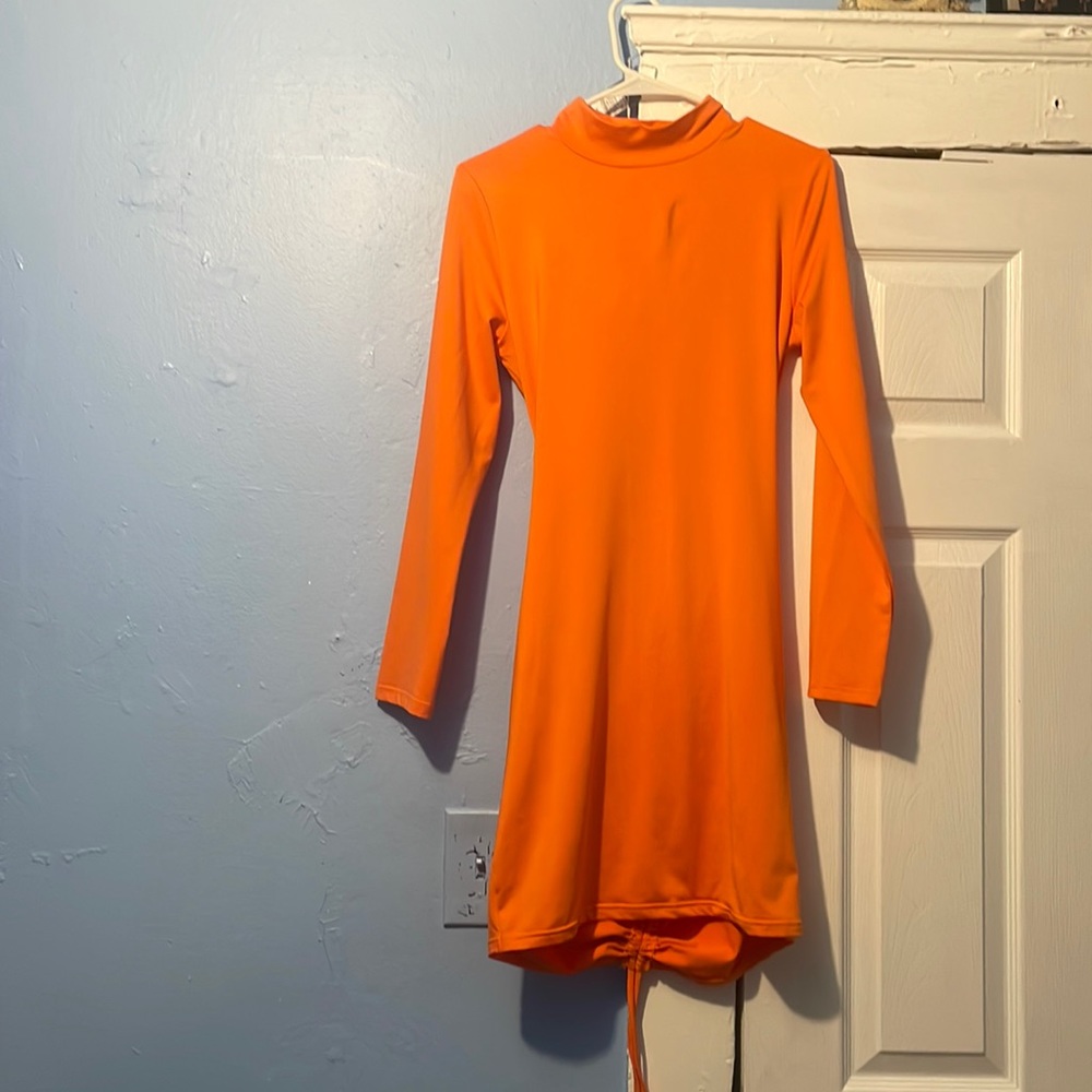 Neon Orange Body con dress 🍊🧡 Backless, long sleeve with mock neck style.